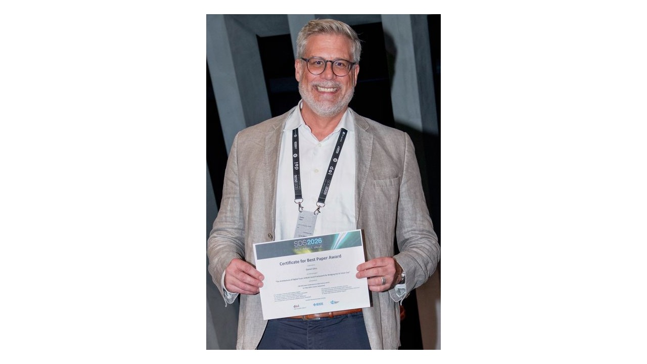 Photograph of Daniel Glinz holding the Certificate for Best Paper Award at the 2026 IEEE Swiss Conference on Data Science and AI.